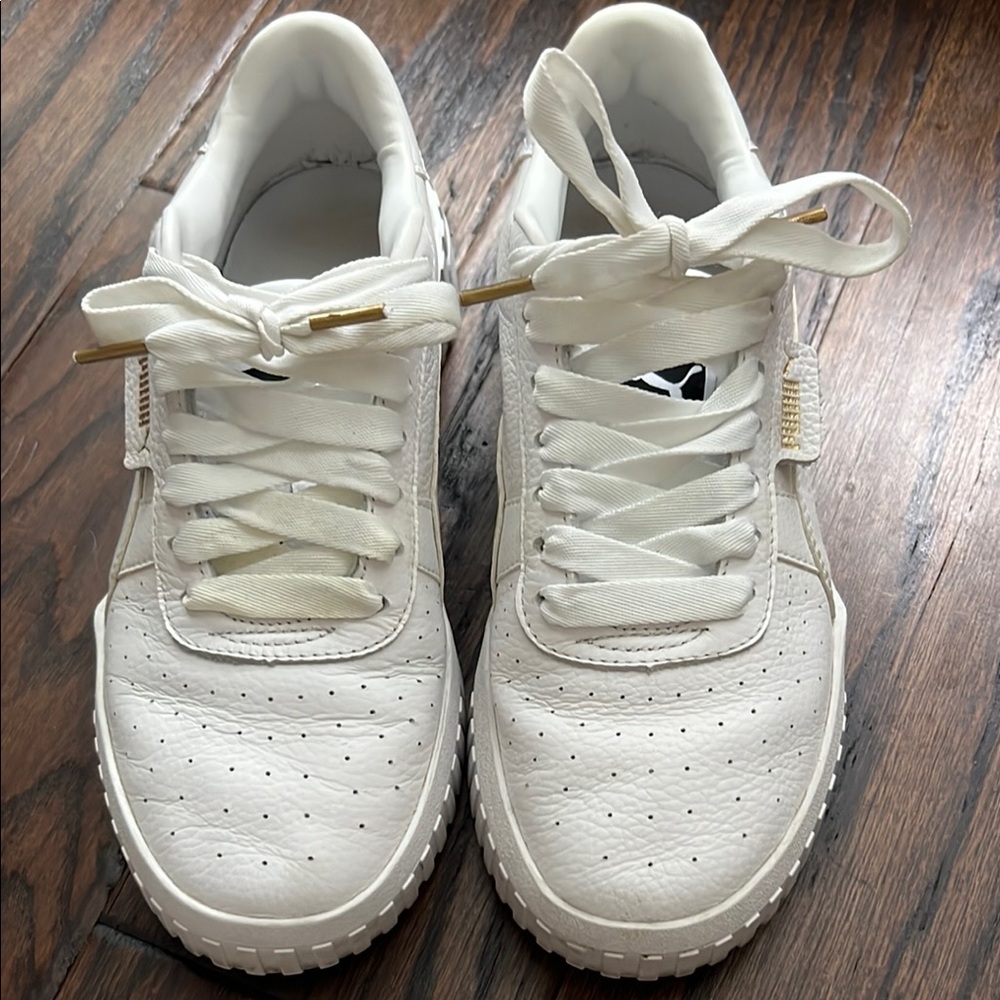 PUMA White Sneakers with Gold Accents